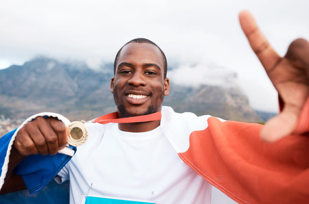 Winner portrait, flag or black man with gold medal, emoji sign and pose for marathon runner,...