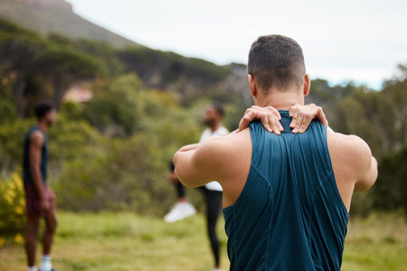 Fitness, nature or sports man with neck pain in exercise, body training injury or outdoor workout. Athlete back view, stress or personal trainer with anxiety, accident or muscle problem emergencyの写真素材