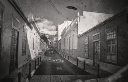 Street, Ufo and city home or travel with clouds and retro buildings or architecture. Spaceship, alien and drone with monochrome technology on road in Italy for outer space, universe and futuristicの写真素材