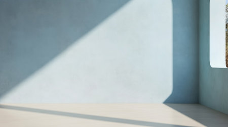 Blue empty wall with shadows and light. Minimal abstract background for product presentationの素材