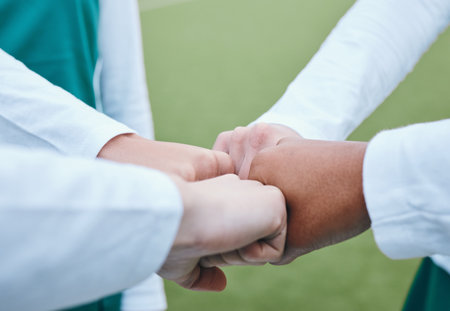 Exercise, closeup and people with support, fist bump and motivation with competition success, sports or fitness. Hands together, group and teamwork with match, celebration and workout with solidarityの写真素材