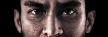 Closeup, soldier and face in sad with depression, anxiety and mental health with black background. Banner, eyes and war crime with man veteran with trauma, ptsd and treatment for anger managementの写真素材