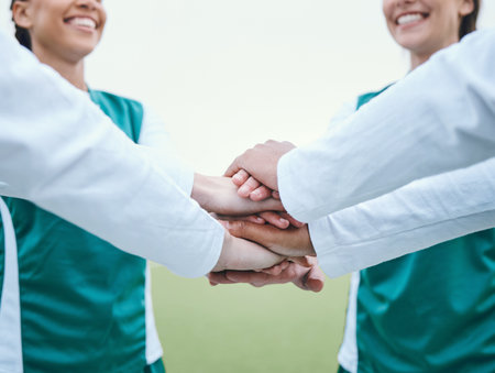 Stack, sports women or hands of team in huddle with support, smile or plan for a hockey training game. Fitness, pride or happy female athletes in practice for exercise or match together for teamworkの写真素材