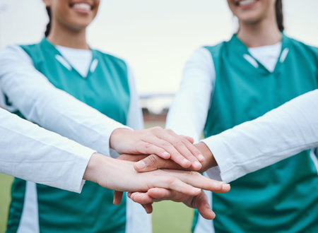 Hands, sports group or team in huddle with support, smile or plan for a hockey training game. Women,...