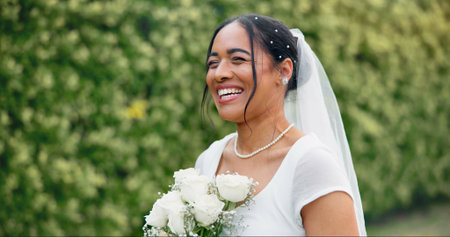 Wedding in garden, bride with smile and bouquet of roses for celebration of love, future and...