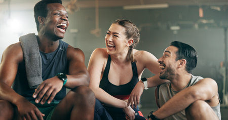 Fitness, group and laughing in gym with confidence, workout and exercise class. Diversity, friends and wellness portrait of funny athlete with community ready for training and sport at a health clubの写真素材