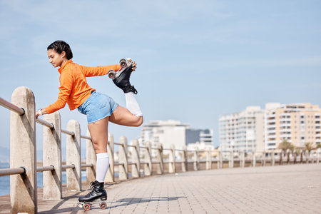 Roller skate, stretching and mockup with a girl at the promenade on a blue sky background for the...