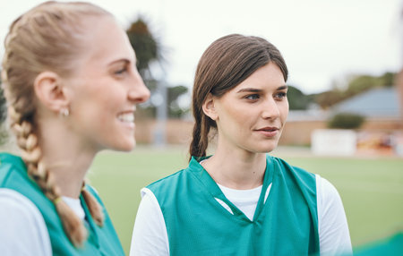 Hockey women, team talk and training on field, circle and advice for game, competition or strategy. Girl, group and together for contest, sports and happy with planning, exercise and listen for goalの写真素材