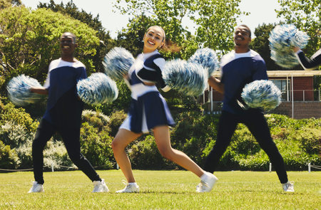Cheerleader team, blur and portrait of people in dance performance on field outdoor for exercise,...