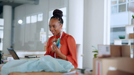 African woman, designer and video call for fashion review, fabric decision and laptop for questions...