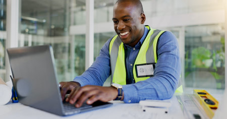 Laptop, design and a black man construction worker in an office for planning a building project....