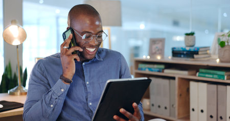 African man, phone call and tablet in office at investing agency in night for deal, networking or email. Happy trader, touchscreen and black business owner with research on stock marketの写真素材