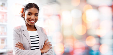 Black woman, arms crossed and smile portrait with compliance consultant at work with mockup space. Confidence, female entrepreneur and professional from New York happy from startup with office bokehの写真素材
