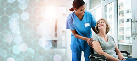 Mature woman, nurse or person with disability in hospital, patient or smile for help, support or care. Medical, health or professional for checkup, wheelchair or friendly with bokeh, clinic or jobの写真素材