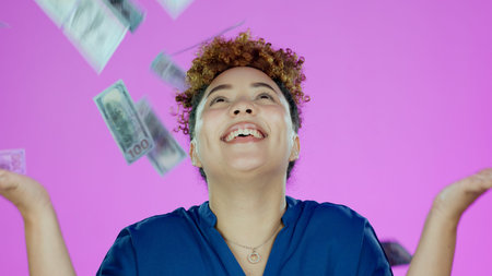 Woman, winner and money rain and success, bonus or winning of lottery prize, profit or cashback in...