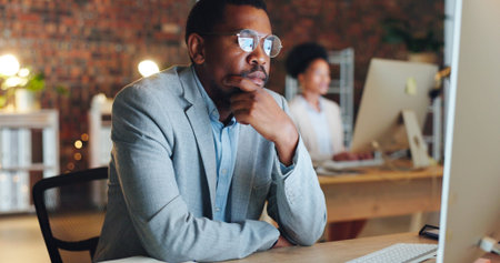Business man, thinking and ideas on computer for office startup, financial decision and planning or...