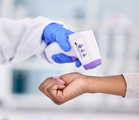 Doctor, hands and thermometer for patient temperature, fever or checkup appointment at hospital....