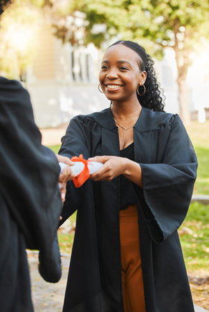 Graduation diploma, ceremony and happy black woman with learning success, education development or graduate scroll. College certificate, academy award or African students achievement on school campusの写真素材