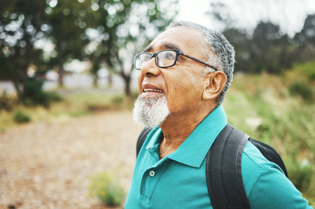 Outdoor, thinking and senior man breathing, peace and calm with retirement, smile and fitness with...