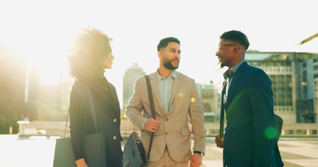 Business people, handshake and team in street, talk and city with meeting, introduction and attorney group. Men, women or corporate law employees with shaking hands, friends or outdoor on road in cbdの写真素材