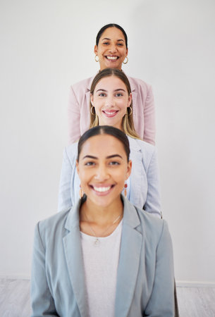 Portrait, leadership and team of business people in row at corporate office. Happy face, group of employees in line and women, consultants or workers together in collaboration, cooperation or successの写真素材