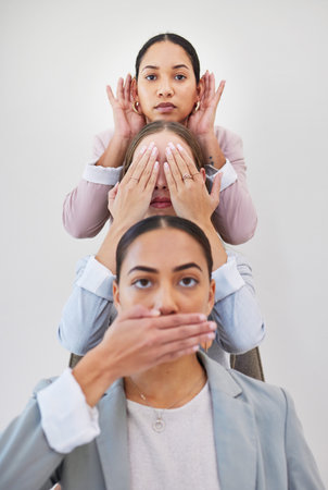 Business, portrait and women with hand gesture for dont, speak, see or hear on wall background. Corporate, compliance or face of work friends with opinion emoji, silence or listen, vision or voiceの写真素材