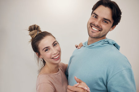 Portrait, smile and couple dance in a house with music, fun and bonding in their home. Face, hug and...