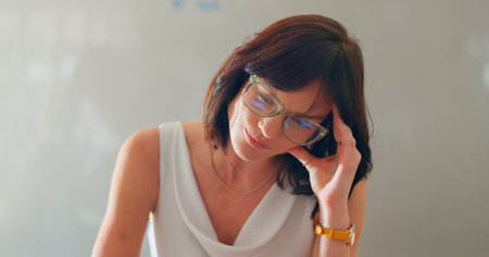 Burnout, headache and a business woman in the office for an audit while thinking about tax or...