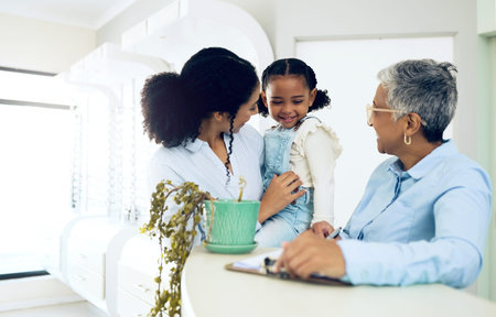 Mother, daughter and pediatrician in a clinic for insurance, healthcare checkup or medical...