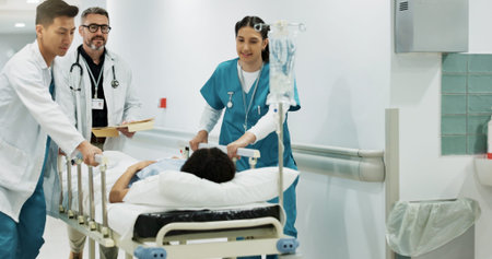 Doctors, people talking and push patient hospital bed, consulting and feedback on medicine treatment, support or ICU surgery. Teamwork, conversation and walking team, nurses or surgeon helping clientの写真素材