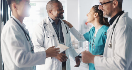 Doctors, nurses and team or hospital management with workflow, schedule planning and speaking of services. Healthcare worker, mentor and people with medical documents, clinic files and internshipの写真素材