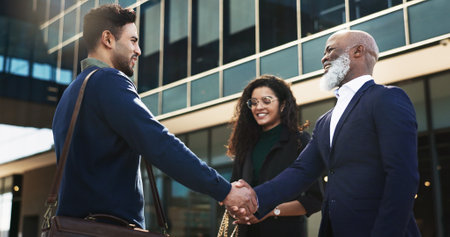 Handshake, city and happy business people for recruitment, career and hiring opportunity. Professional, collaboration and workers shaking hands for agreement, thank you and b2b deal for successの写真素材