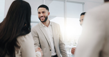 Happy businessman, handshake and meeting in teamwork, agreement or promotion at office. Business...