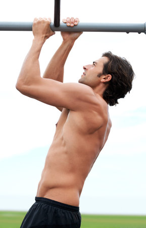 Pull up bar, fitness and man training for muscle building growth, bodybuilder performance or...