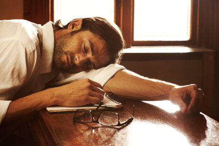 Writer, notebook and sleeping or tired of writing for journalist or media freelance career. Fatigue,...