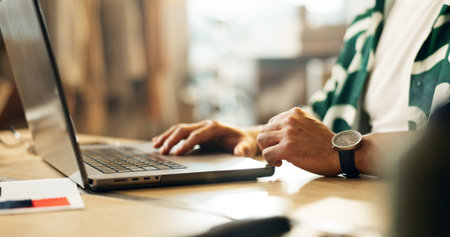 Closeup, business and man with a laptop, typing and network with connection, supply chain or...