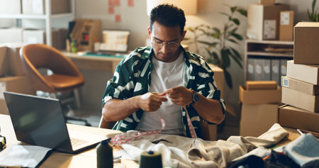 Man, fashion designer and fabric tape for manufacturing clothes and measure for startup or small business in office. Tailor or entrepreneur with sewing inspiration, online shop ideas and planningの写真素材