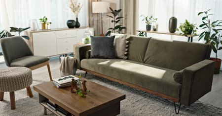 Home, interior and background of living room with sofa, couch and table of furniture. Lounge design...