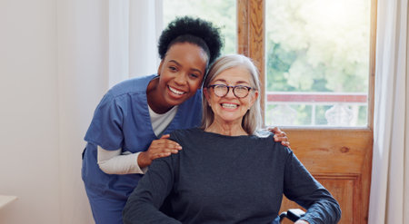 Senior care, caregiver and old woman with wheelchair, portrait and smile in health at nursing home. Support, kindness and happy face of nurse with elderly person with disability for homecare service.の写真素材