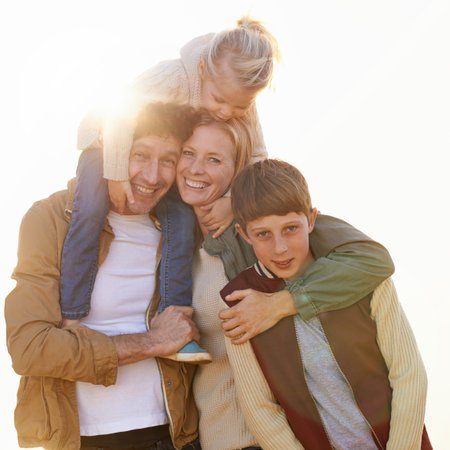 Keep your loved ones close. Cropped portrait of a loving family standing together in the outdoors.