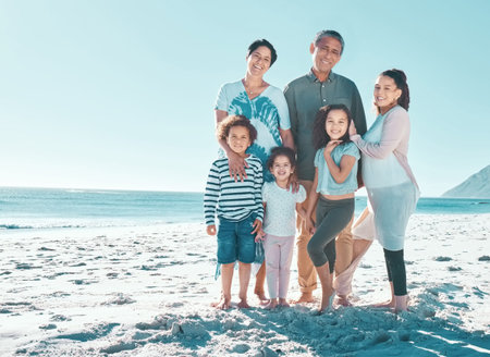 Its always a good day at the beach. a multi-generational family spending the day at the beach.
