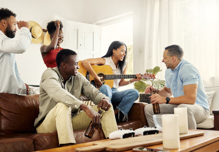 My friends are so special and so talented. a woman playing the guitar while sitting in a living room...