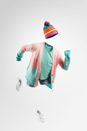 The winter wear sale is now open. Studio shot of an invisible woman running against a grey...