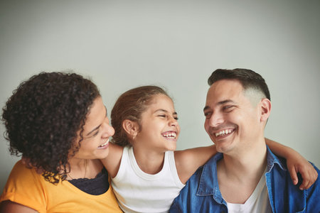 Shes quite the joker. a happy young family spending quality time together.の写真素材