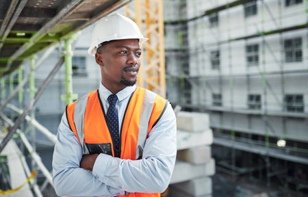 Quality levels thats as high as their buildings. a confident young man working at a construction site.の写真素材