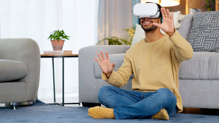Home, virtual reality glasses and man on the floor, gaming and connection in a living room. Person,...