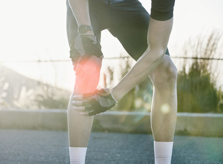 Man, knee and joint pain from cycling, sport and emergency with red glow overlay in countryside...