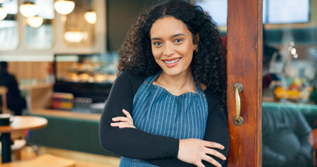 Small business, cafe and arms crossed with smile, waitress and startup for coffee shop, door and...