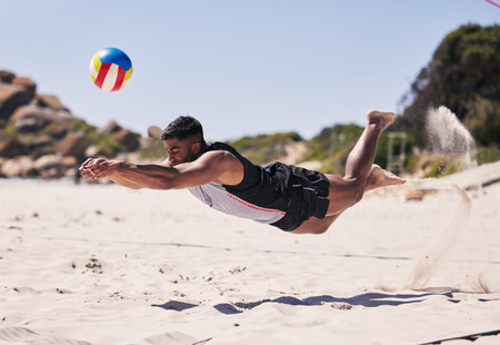 Beach, energy and man jump volleyball while playing on the sand with action on holiday. Fitness...