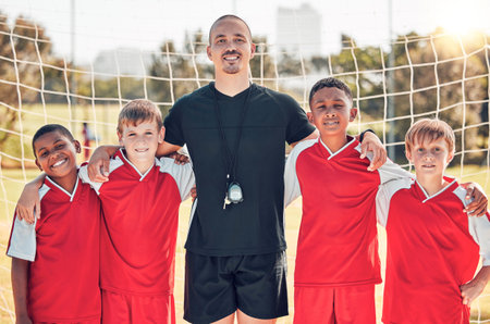Soccer, football coach and kids team stand in goal post for team solidarity, tournament game and...